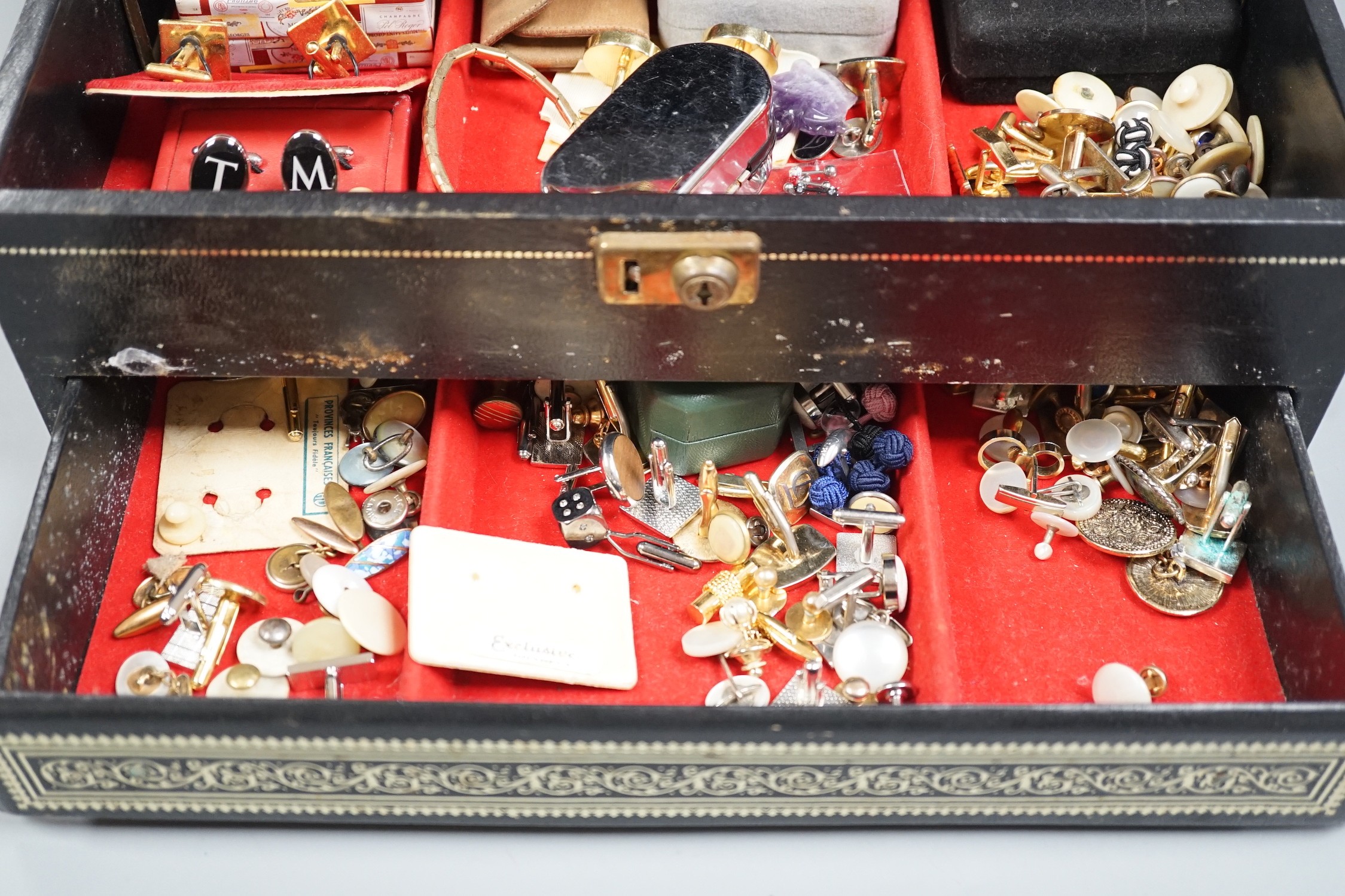 A group of assorted costume cufflinks, etc.